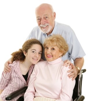 Portrait of loving grandparents and granddaughter.  Isolated on white.  