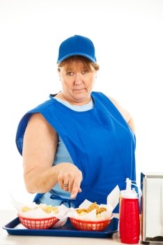 Unfriendly, no-nonsense cashier at a fast food restaurant, serving your order.  Isolated on white.