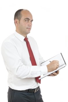 employee holding black notebook and pen on white background