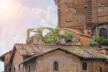 Picturesque Italian house with flowers on the terrace