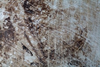 An image of a background of scratched  rusty metal