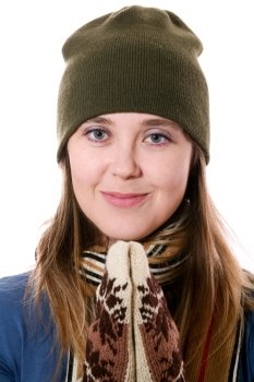 An image of a nice girl in a green hat and mittens