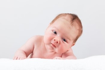 portrait of adorable baby. beautiful baby boy on white background.  1 month baby.