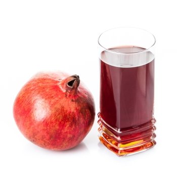 Pomegranate isolated on white background. Pomegranate juice