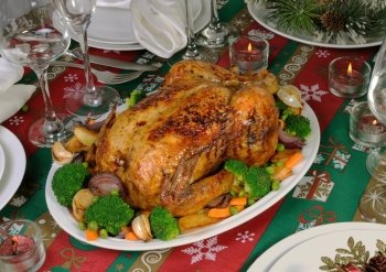 Baked chicken with vegetables on the festive table