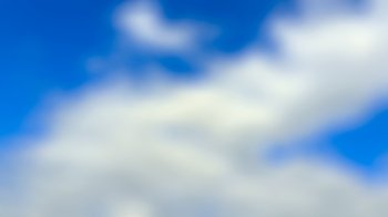Cloud bright blue sky blurred background.