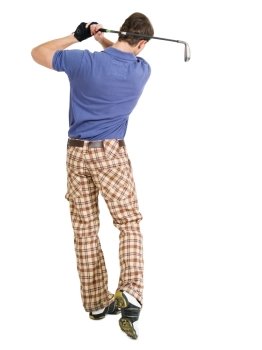 Photo of a male golfer in his late twenties finishing his swing with a wedge.
