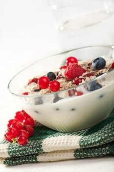 yogurt with cereal and wild berries
