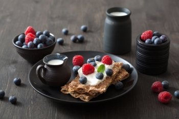 crisp bread with creme fraiche and berries 