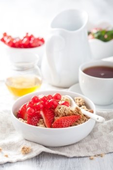 healthy breakfast with granola and strawberry 