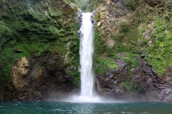 Rock, pool and waterfall in Batad, near Banaue