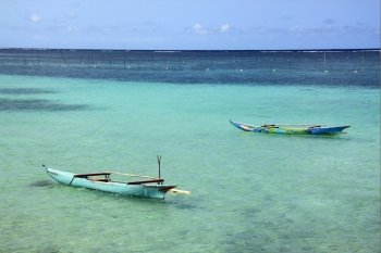 Two boats on the water in Samoa