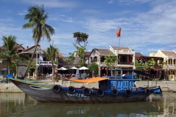 Big boat in canal in Hoi An, Vietnam                 