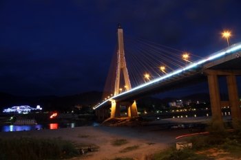 Bridge on the Mekong in Jinhong at night, China