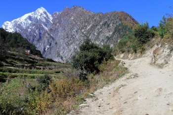 Wide footpath and field in mountain in Nepal