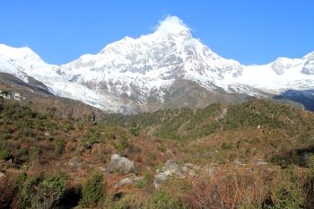 Blue sky and snow on the top of Manaslu in Nepal