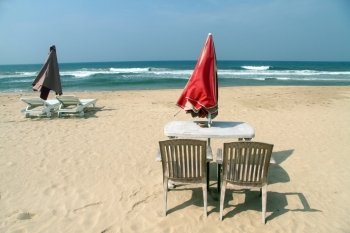 Table and beds on the Bentota beach, Sri Lanka