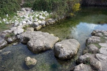 Rocks and water from Ein Ivka spring, Israel