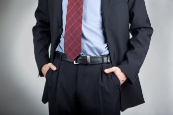 Businessman with hands in his pocket