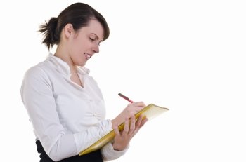 Portrait of happy business woman writing something on document folder