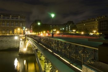 The Pont Neuf in Paris at night.