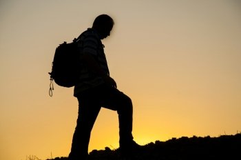 sunset backpack walking human