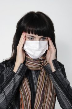 Girl with a headache, suffering from flu, A(H1N1)
