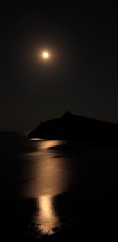 Seascape at night. The coastline moonlight and stars in the sky. Noviy Svet, Crimea, Ukraine
