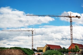 Modern cranes at a construction site