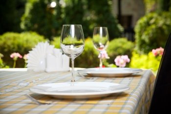 Outdoor restaurant dining table, place setting
