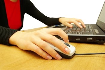  hands fast typing on laptop