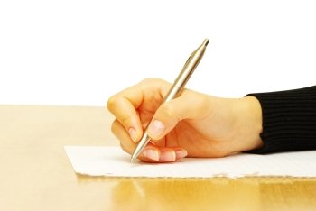 businesswoman writes a pen on an empty paper