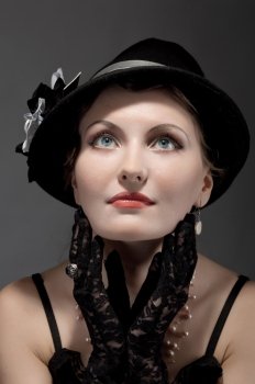 Woman retro revival portrait.girl in hat