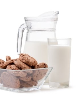 glass of milk and chocolate chip cookies on white background