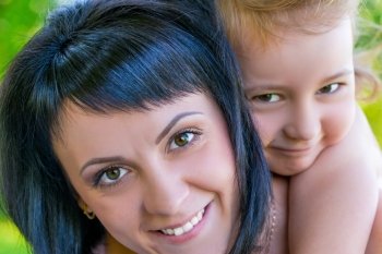 close-up portrait of a beautiful mother and daughter