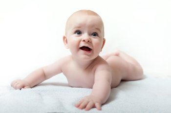 caucasian baby boy with blue eyes on white background