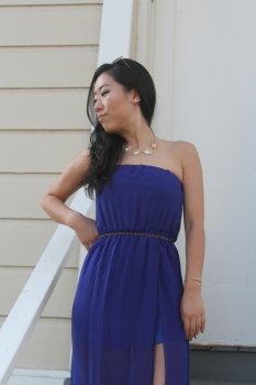 Pretty Chinese  girl in a blue dress