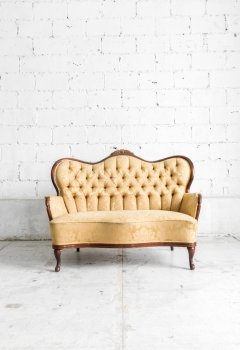 Brown Retro classical style sofa couch in vintage room 