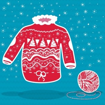 Red knitted christmas sweater and a ball of yarn on blue background. Red knitted christmas sweater and a ball of yarn