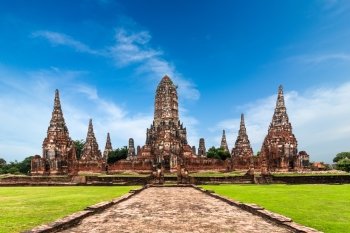 Asian religious architecture. Amazing panorama view of ancient Chai Watthanaram temple ruins under blue sky. Ayutthaya, Thailand travel landscape and destinations