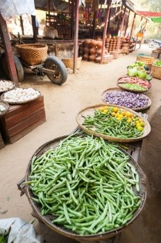 Traditional local fruits and vegetables for sale at outdoor asian marketplace. Bagan, Myanmar. Burma travel destinations
