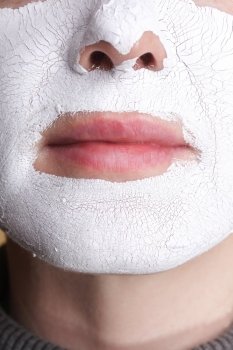Mature woman with facial Mask. Spa