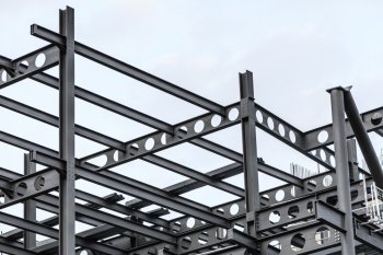 Construction site. Steel structure metal girders skeleton of a new modern building