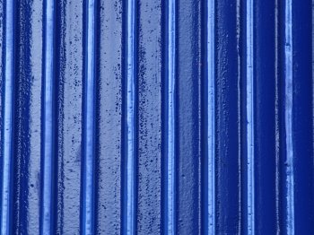 Blue metal wall texture or industrial background