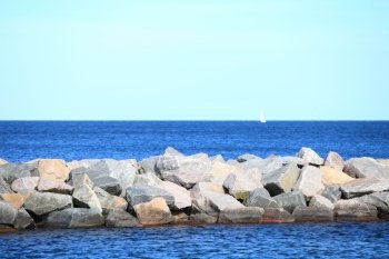 Stone breakwater seawall for protection of coast