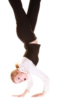 Business. Overworked businesswoman walking on hands isolated on white. Busy woman upside down.